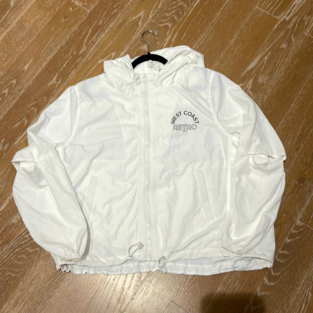 Forever 21. Light nylon shell with hood, vented back and elbows. Never worn.